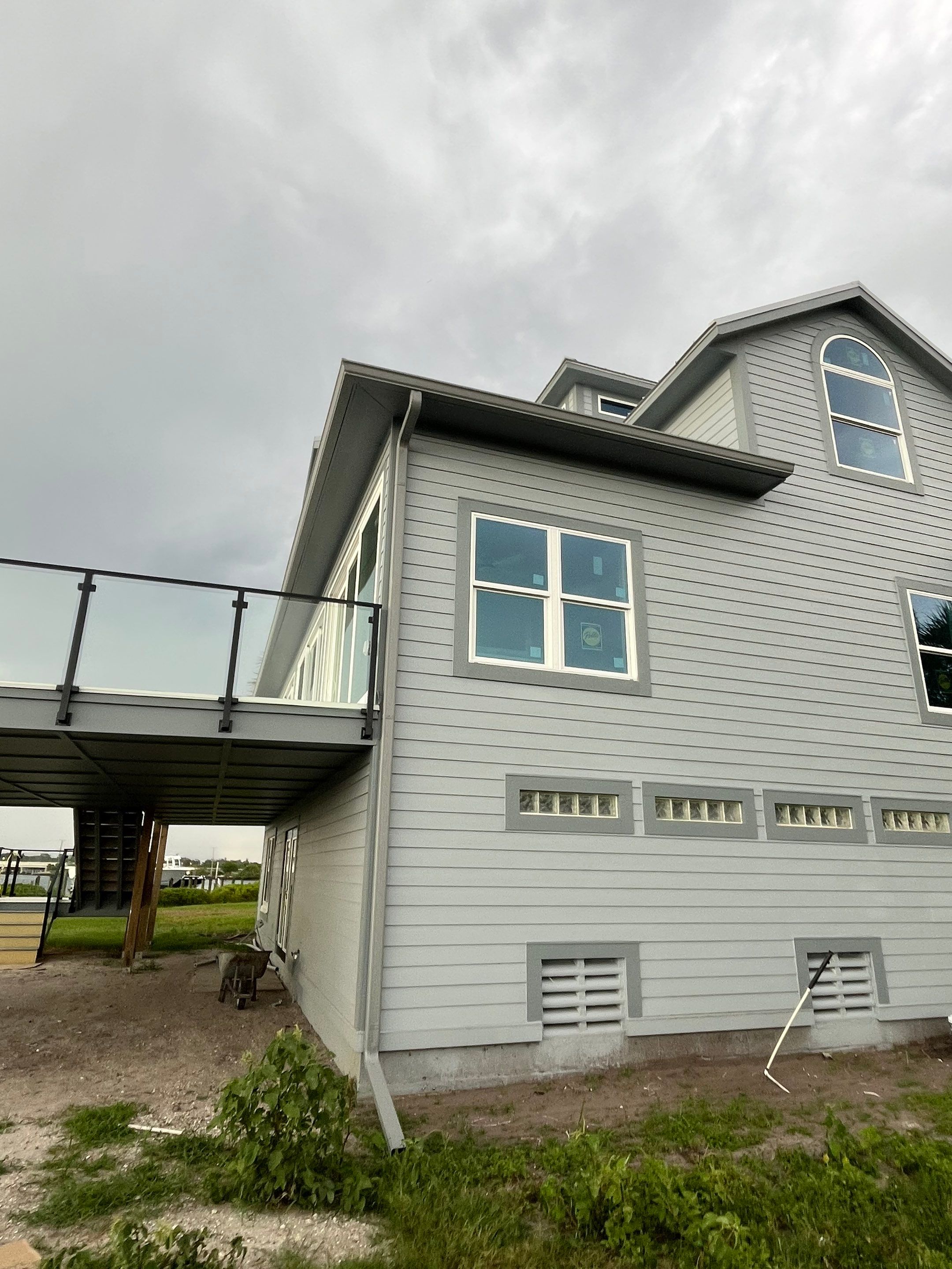 Downspout Installation Dove Grey Palmetto FL by Gutter Professors