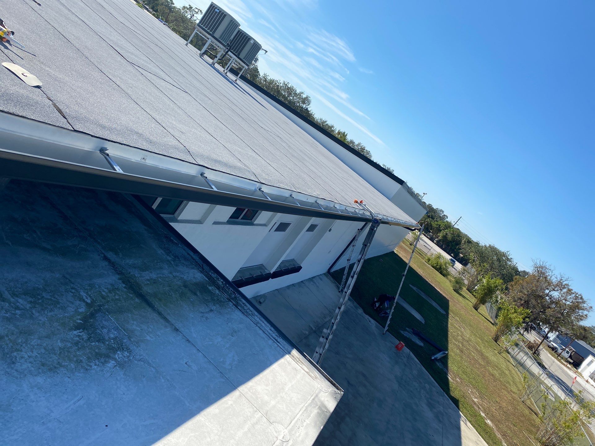 Black Seamless Gutters for Modern Homes in Sarasota FL by Gutter Professors