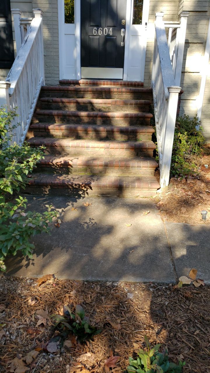 Driveway Clean using cleaner by Power Wash Masters LLC