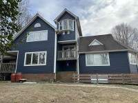 Siding Installation using JH Plank Select Cedarmill Eased edge