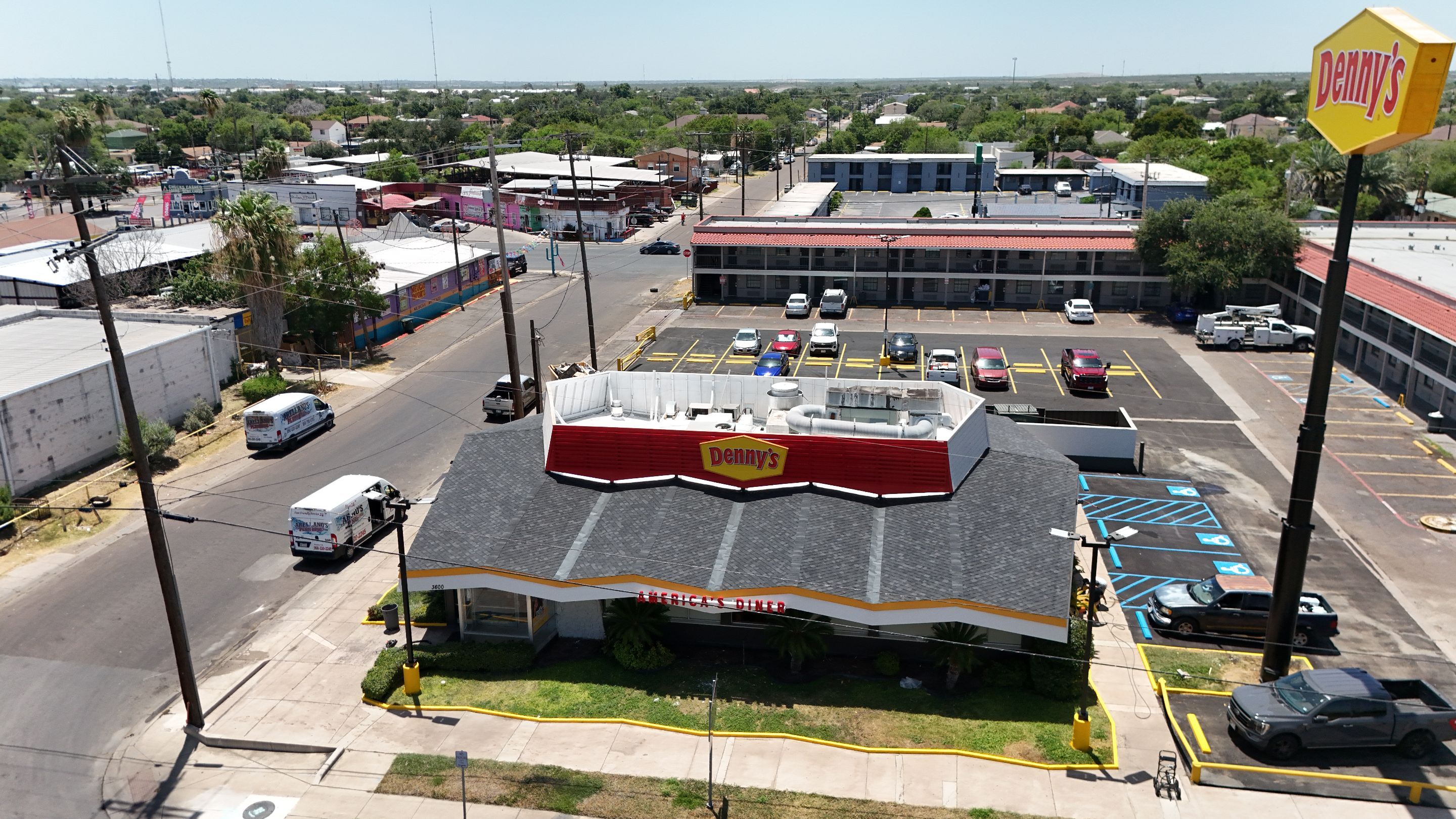 Commercial Asphalt Shingle and Flat Roof Installation in Laredo by JM Flores Roofing & Construction, Inc