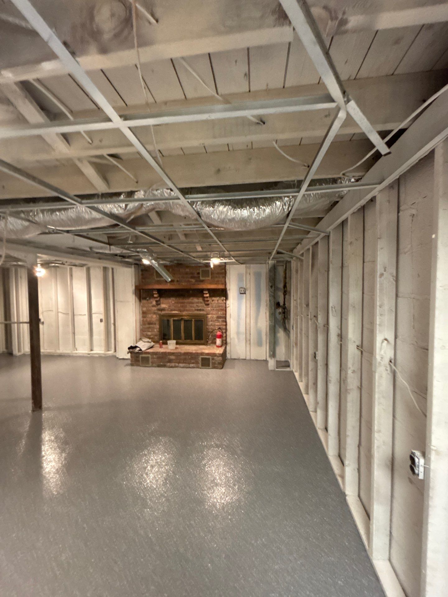 Basement Concrete Floor Coating with Penntek Flake System by Spectrum Painting, LLC