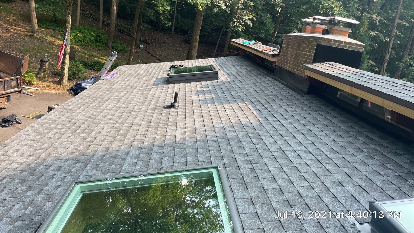 Deckhouse Roof Replacement by American Home Contractors