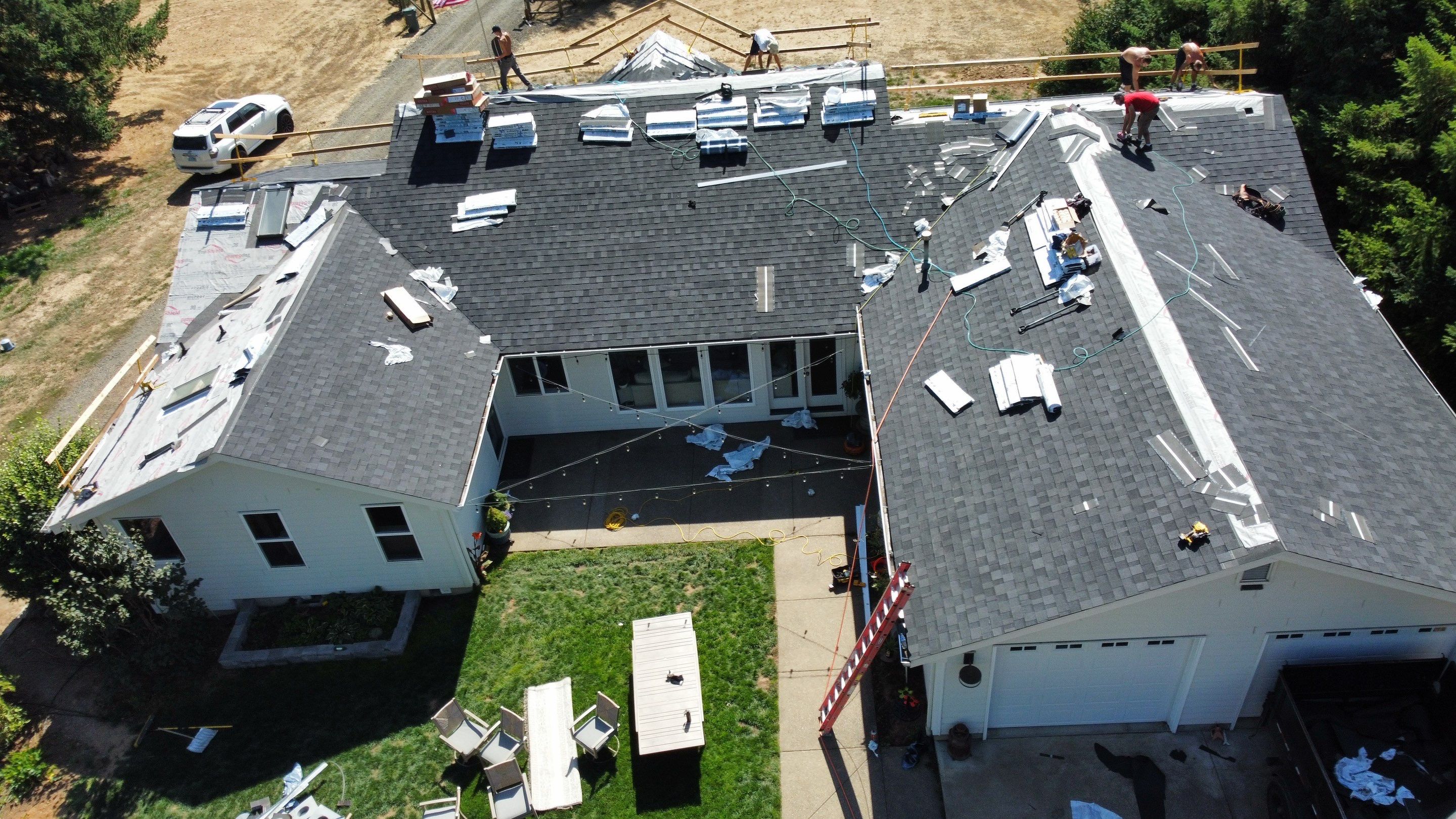 Residential Roofing Installation using IKO Dynasty (Color: Granite Black) by Orezona Building & Roofing Company, Inc.