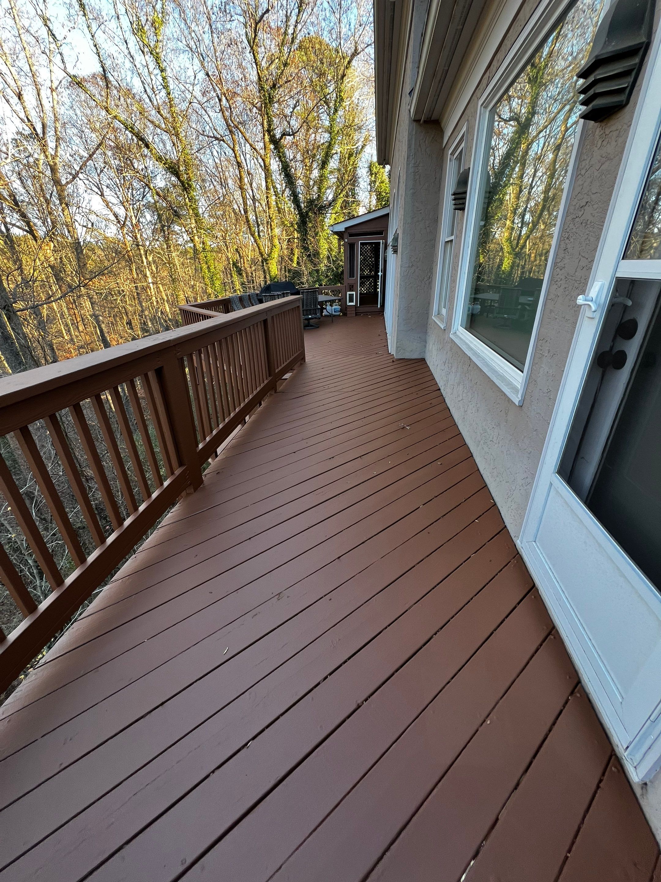 Wood Privacy Fence Installation and Multi-Level Deck Staining in Atlanta by Swift Home Renovations 