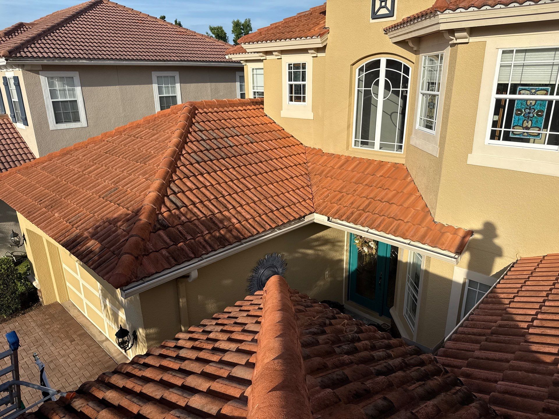 Soft Wash Tile Roof Cleaning in Sonoma Community, Sarasota, FL by Sunshine AquaWash