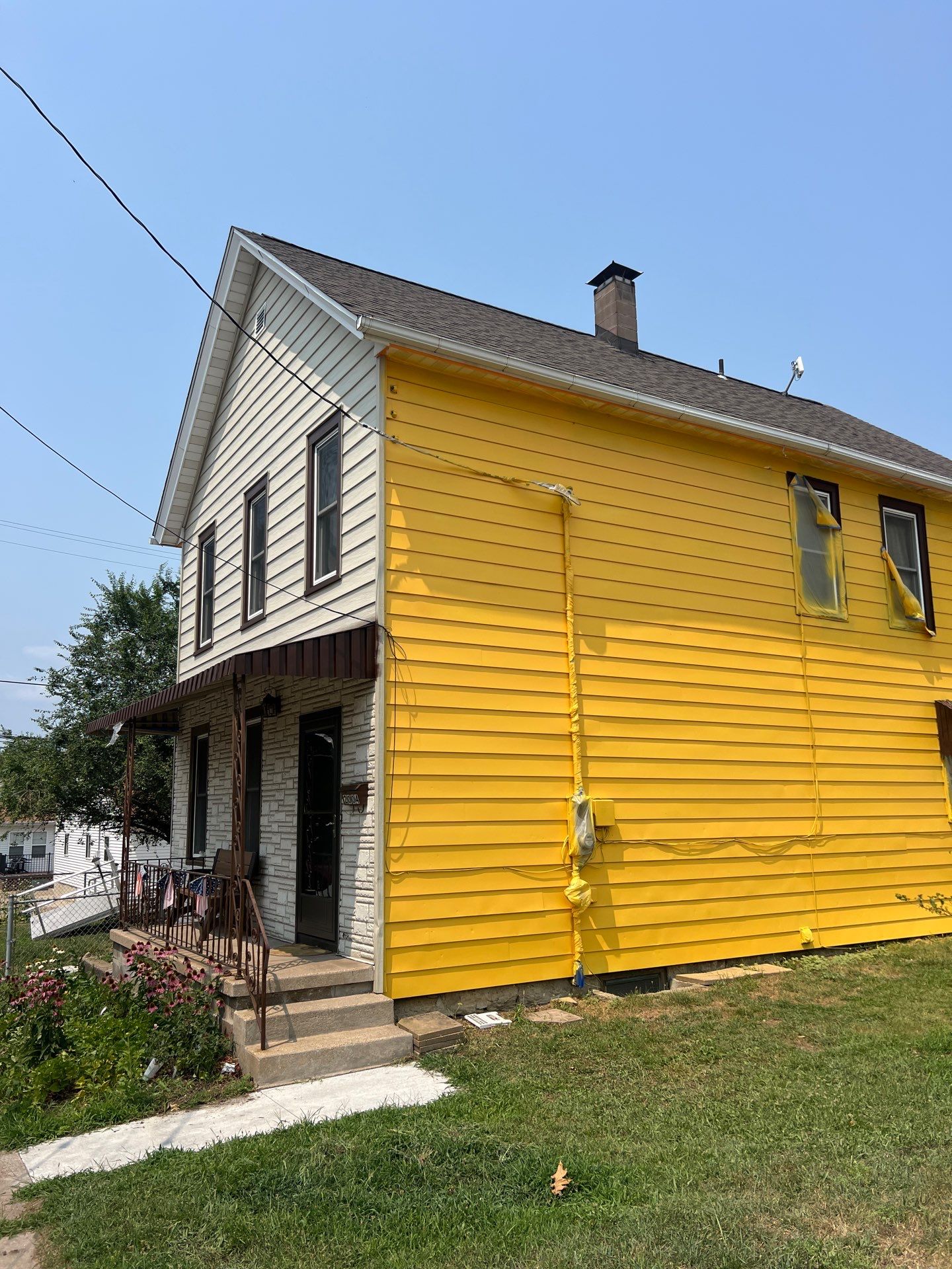 Brightening the exterior of this home with a fresh coat !! by Grandview Painting