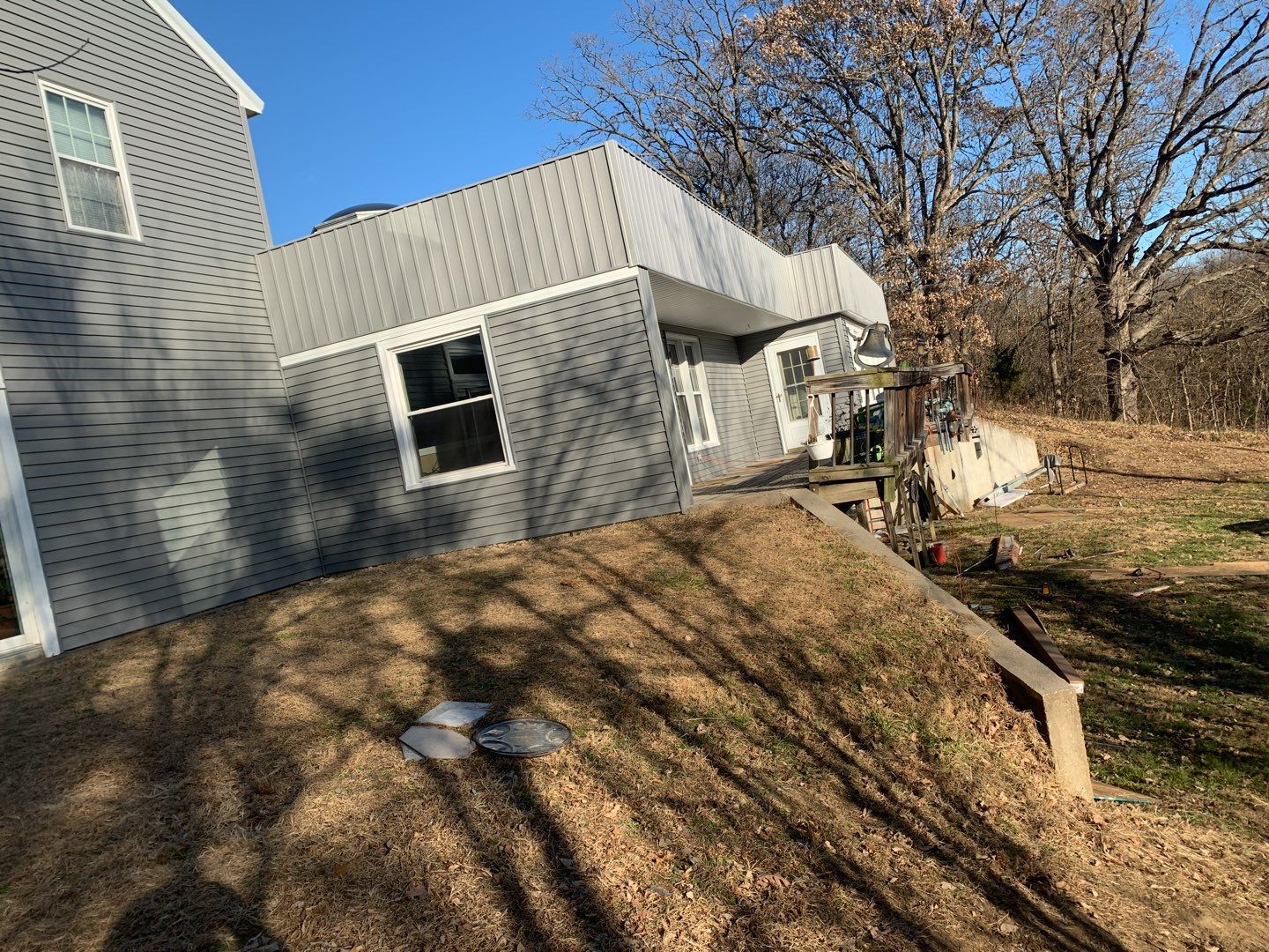 Contemporary house Siding Installation using Mastic Premium Vinyl siding  by EEC  Windows, Siding & Roofing 