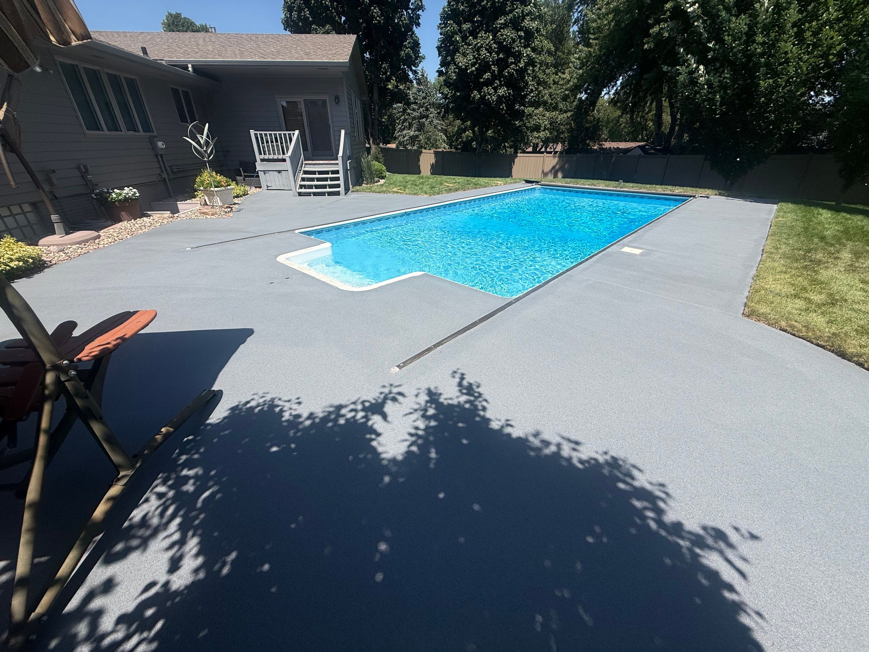 Residential Pool Deck Resurfacing in Sioux Falls by Select Painting, Coatings & Garage Cabinets