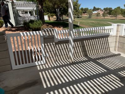White Box Picket Fence on top of block wall 