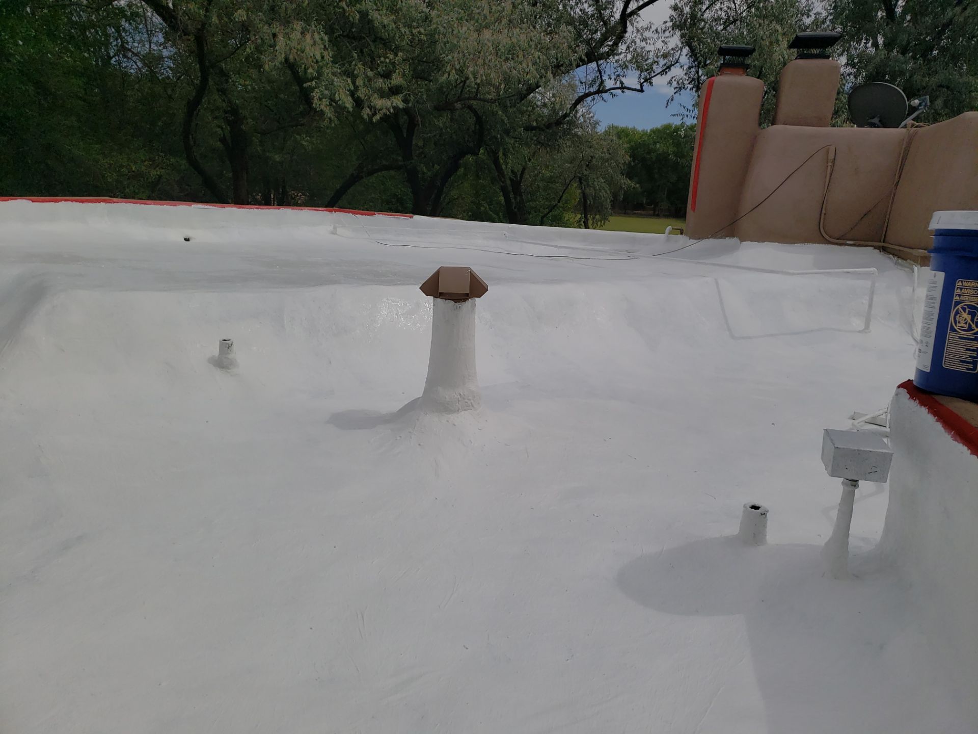 Residential roof application by SPF Services 