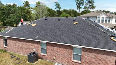 Rustic Black Shingle Roof Replacement — Spring, TX