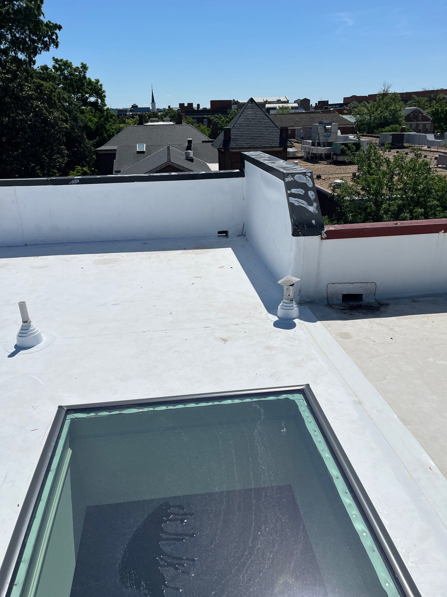 Alexandria: Carlisle Syntec TPO Flat Roof Installation by RM Banning, Inc.