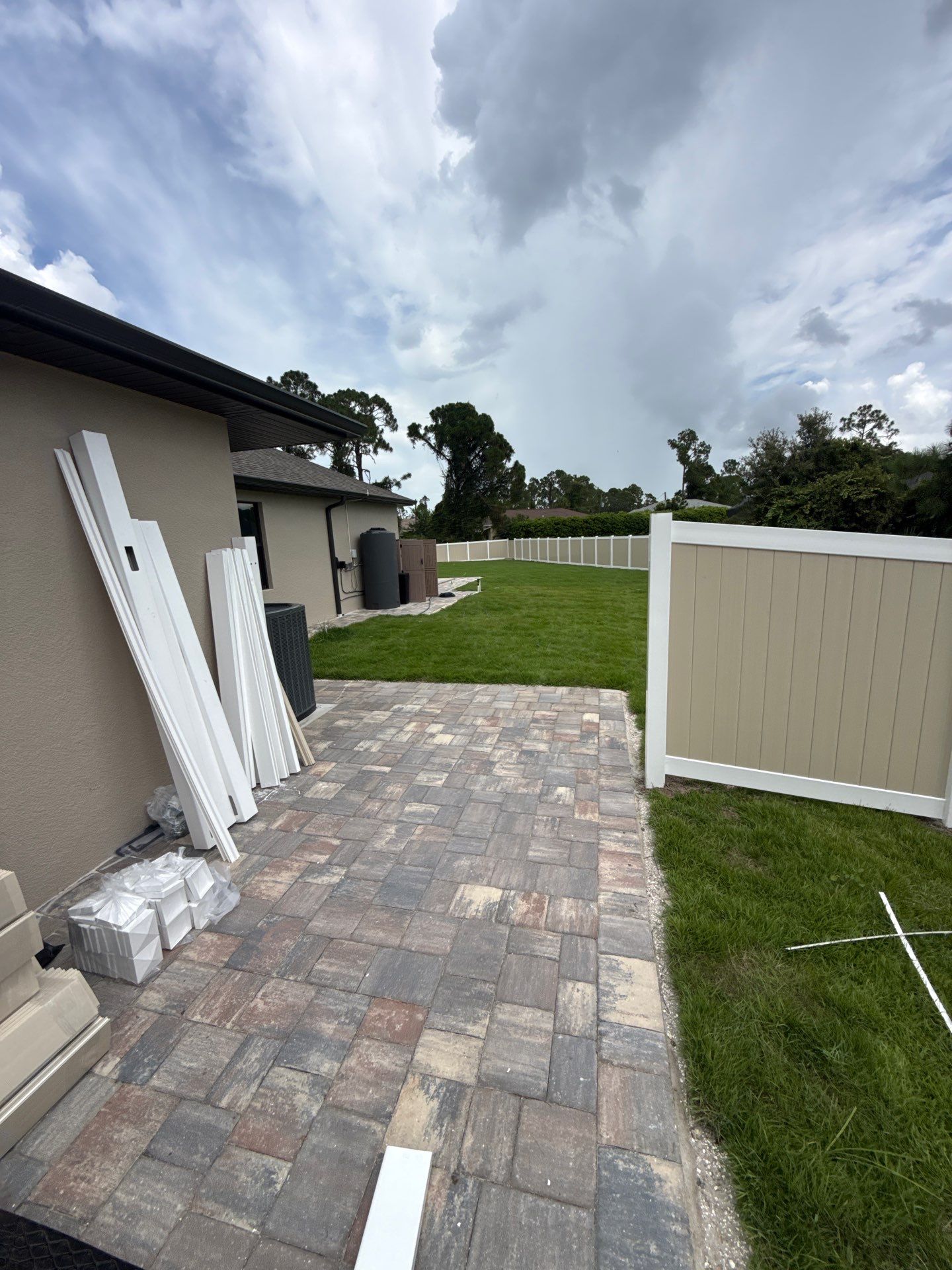 Custom Two-Tone Vinyl Privacy Fence Installation in North Port by True Fence LLC