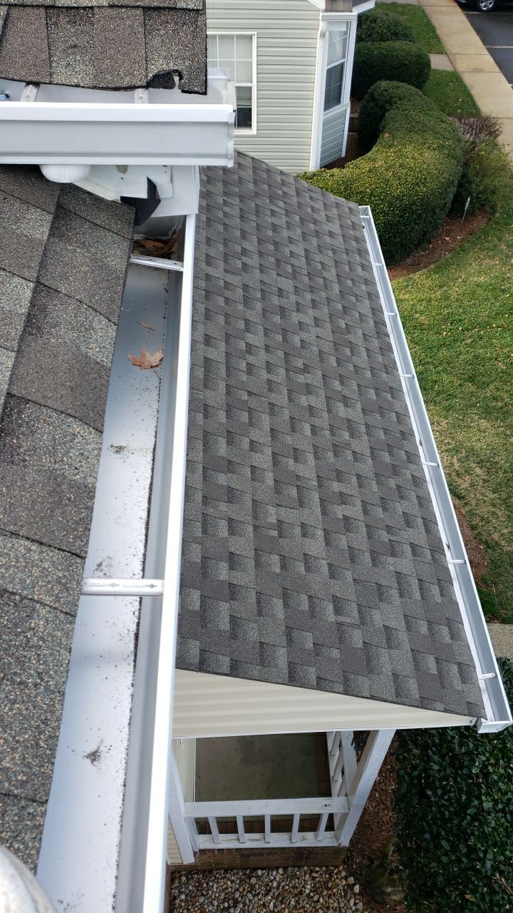 Gutter Cleaning using water by Power Wash Masters LLC