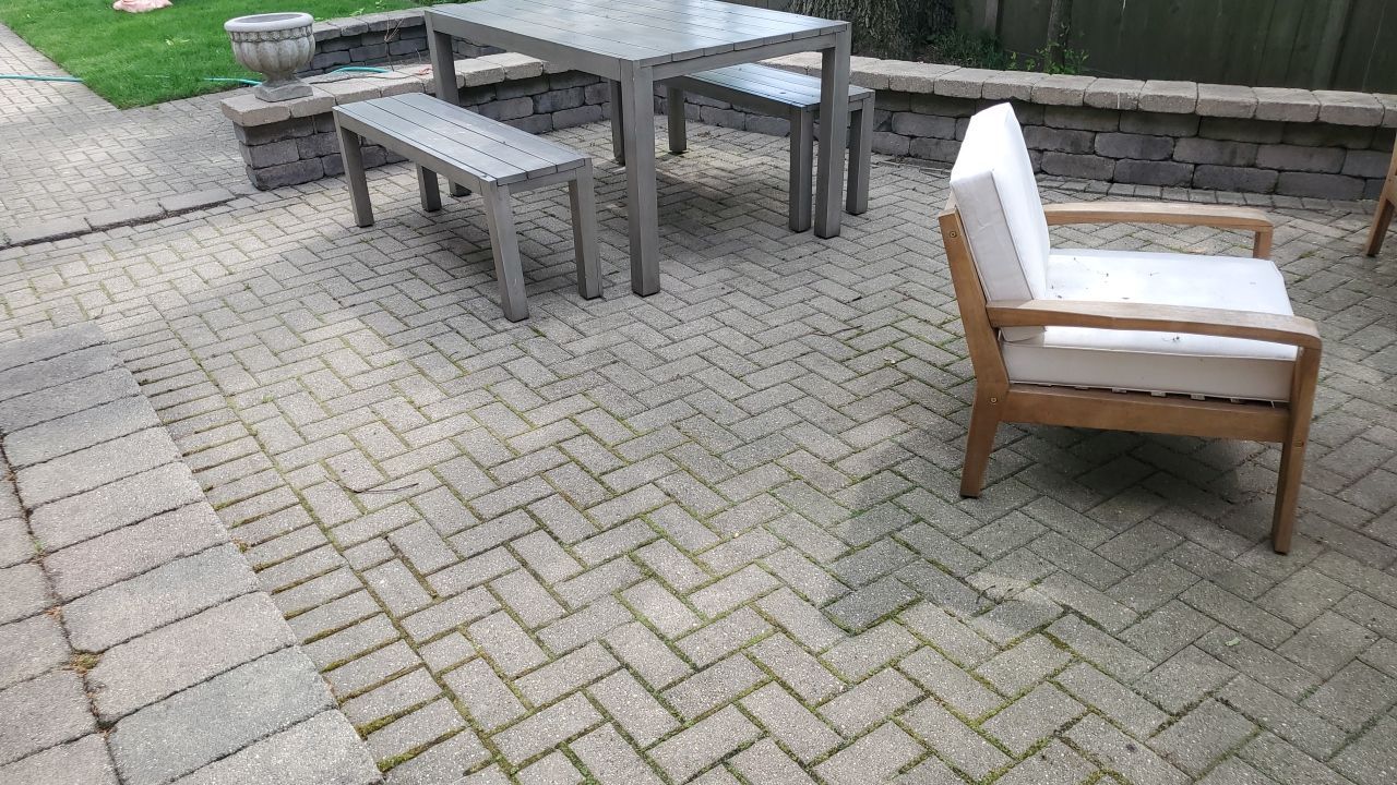 Brick patio repair, clean sand and seal by Northern Power Washing LLC.