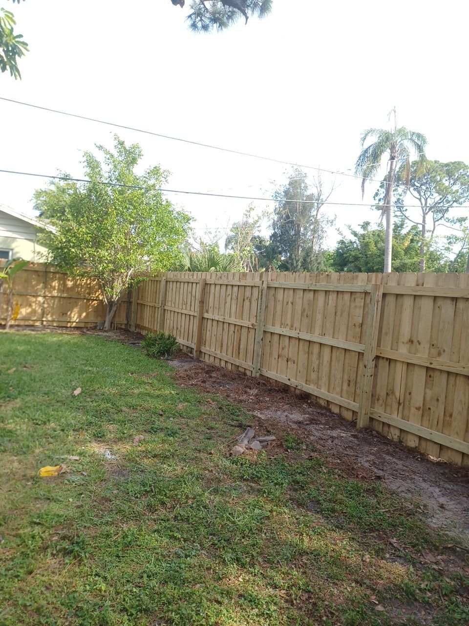 Sarasota, FL 6ft. Tall Treated Board on Board Wood Fence by Asap fence and gates, LLC