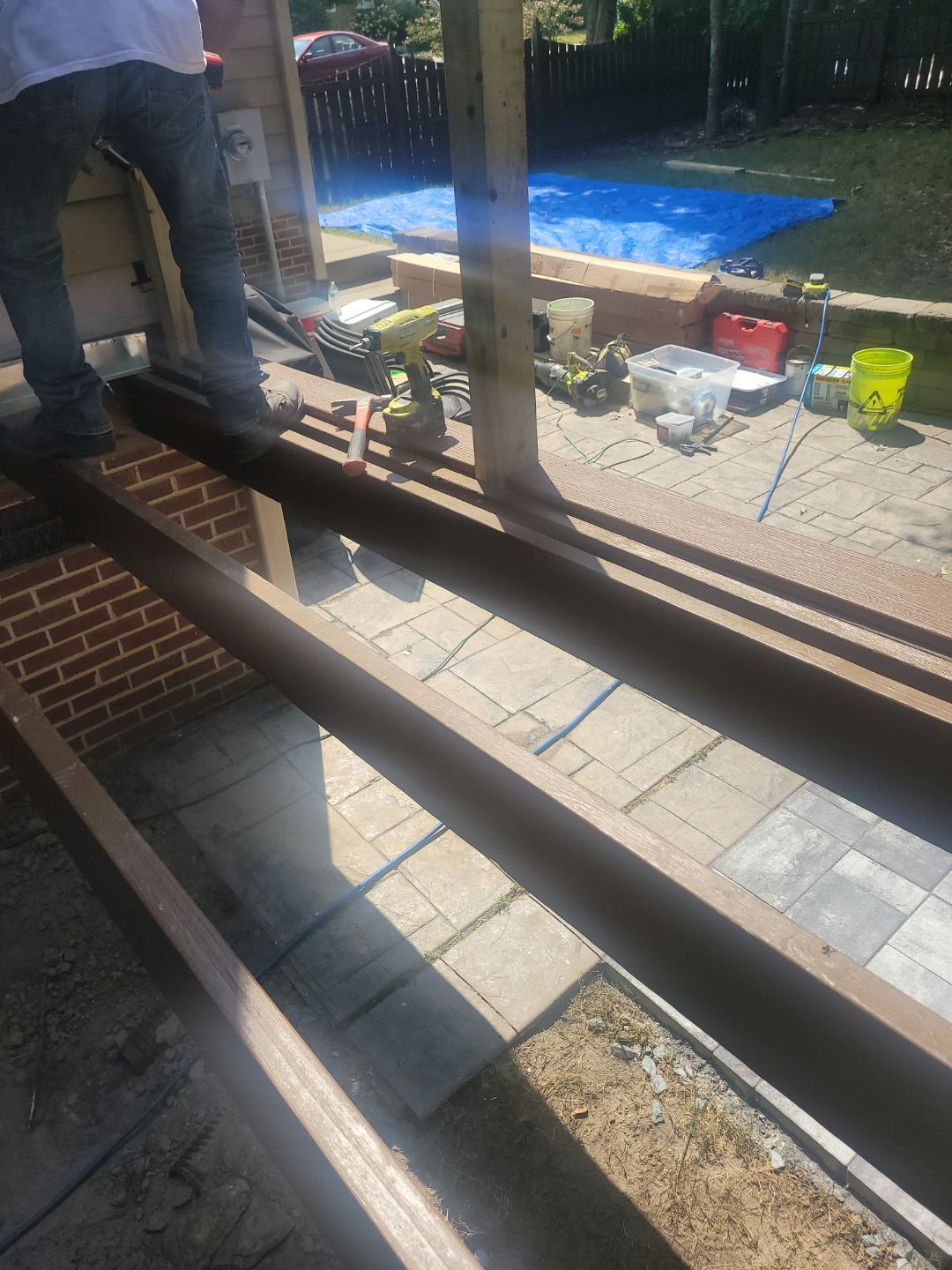 Fuquay-Varina Outdoor Upgrade – Composite Deck & Paved Landing by Elite Remodeling and Design LLC