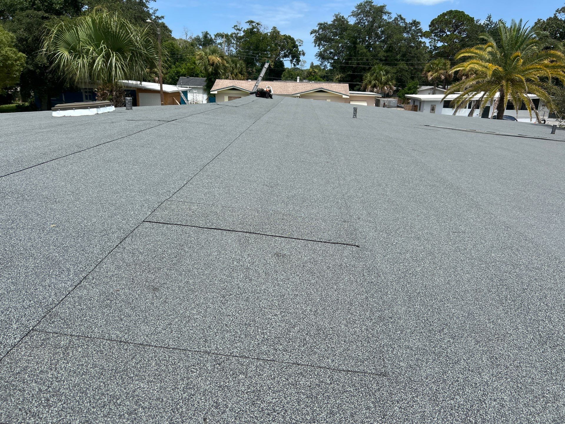 Colonial Slate Modified Bitumen Flat Roof Replacement in Daytona Beach by Pinnacle Roofing Group