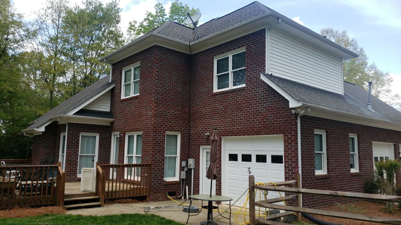 House Wash using cleaner by Power Wash Masters LLC