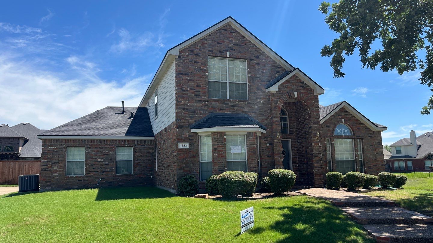Roof Replacement by Rainy Day Restoration