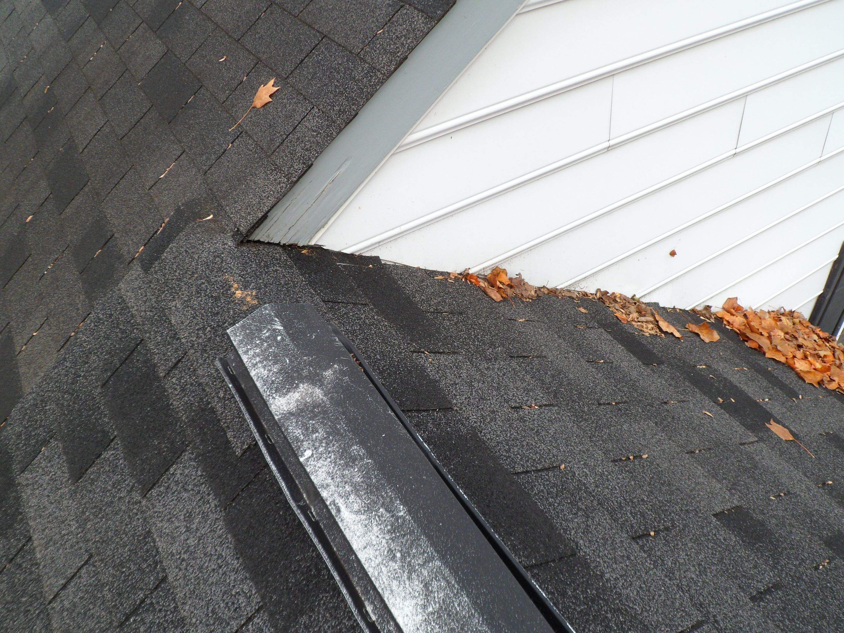 Residential Roofing Installation using Charcoal Black by Alpha Design Services