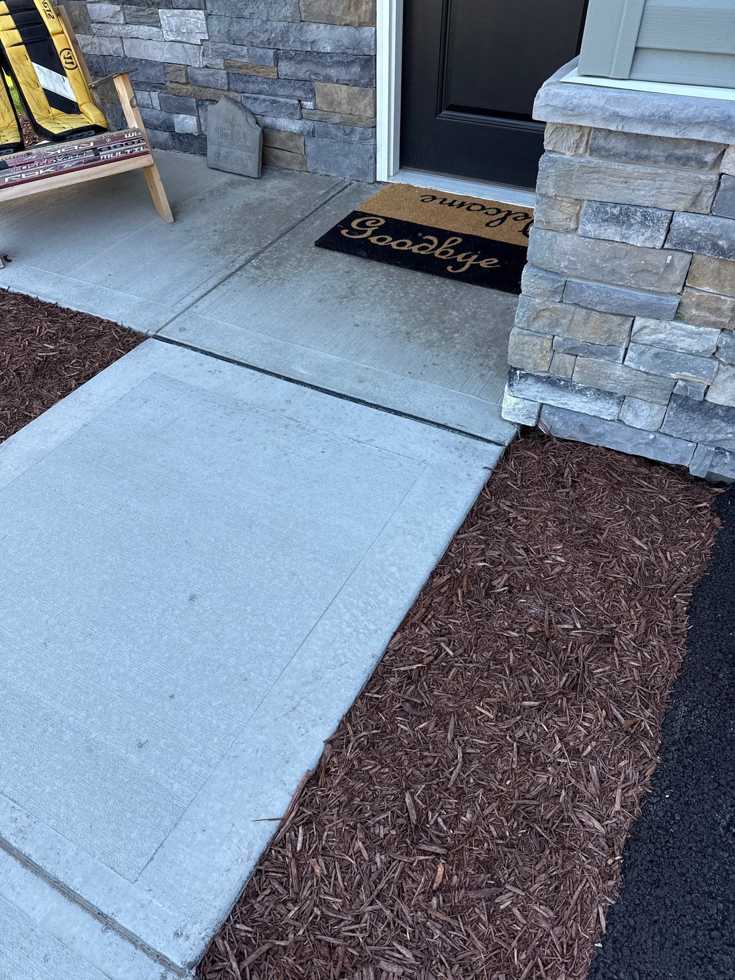 Porch + Garage Project in Evans City by Floors in a Day, Inc