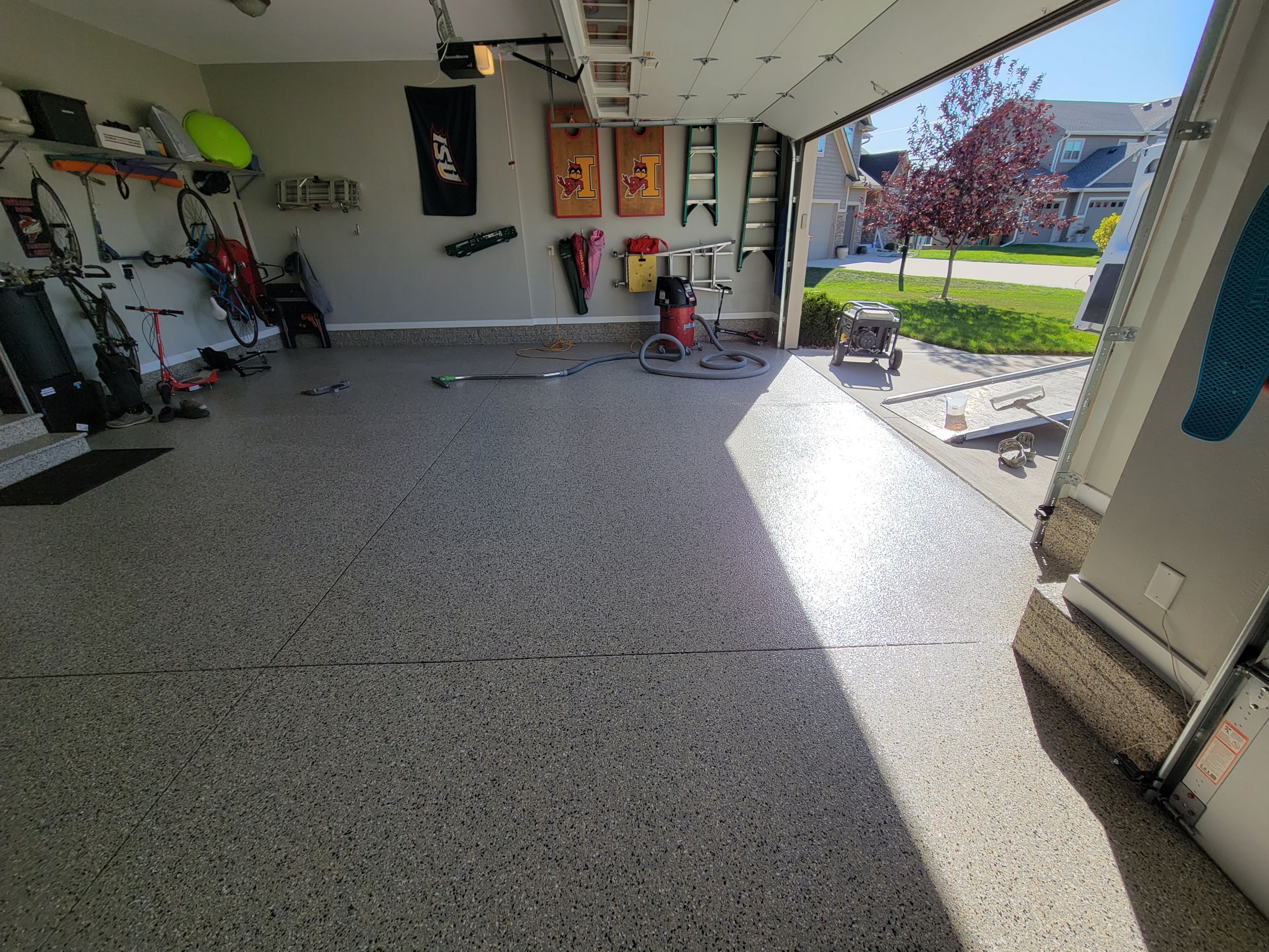 Grimes, IA Transformation: Professional Grade Garage Floor Coating by Revival Concrete Coatings