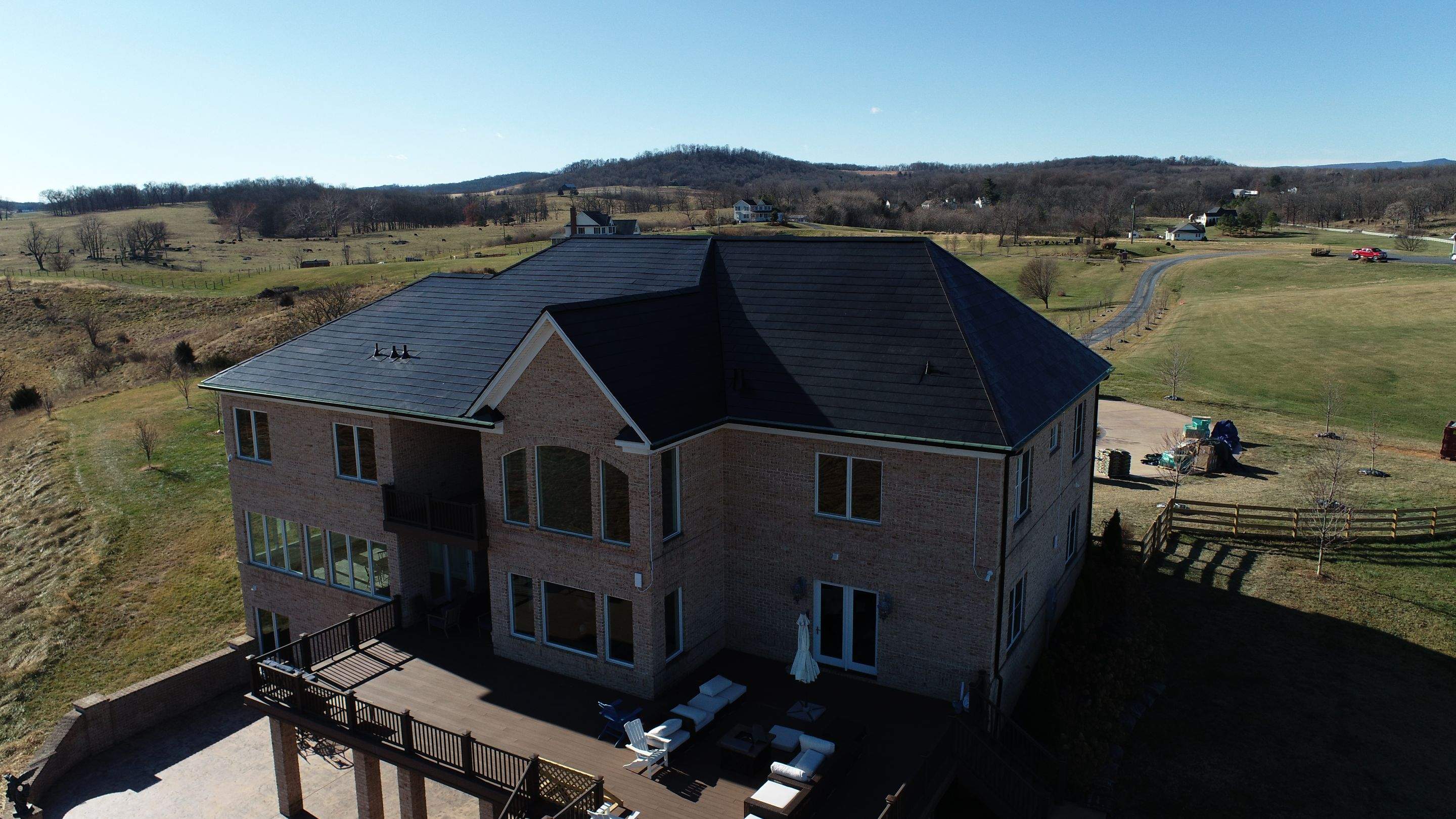 Tesla Solar Roof Replacement by American Home Contractors