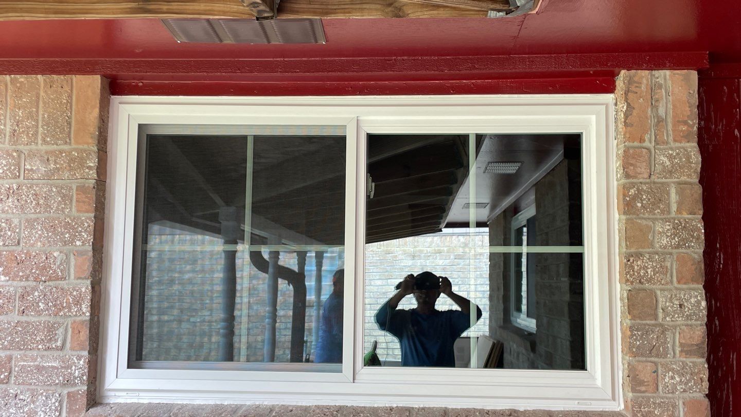 Black and white and red all over by Bayfront Roofing and Construction
