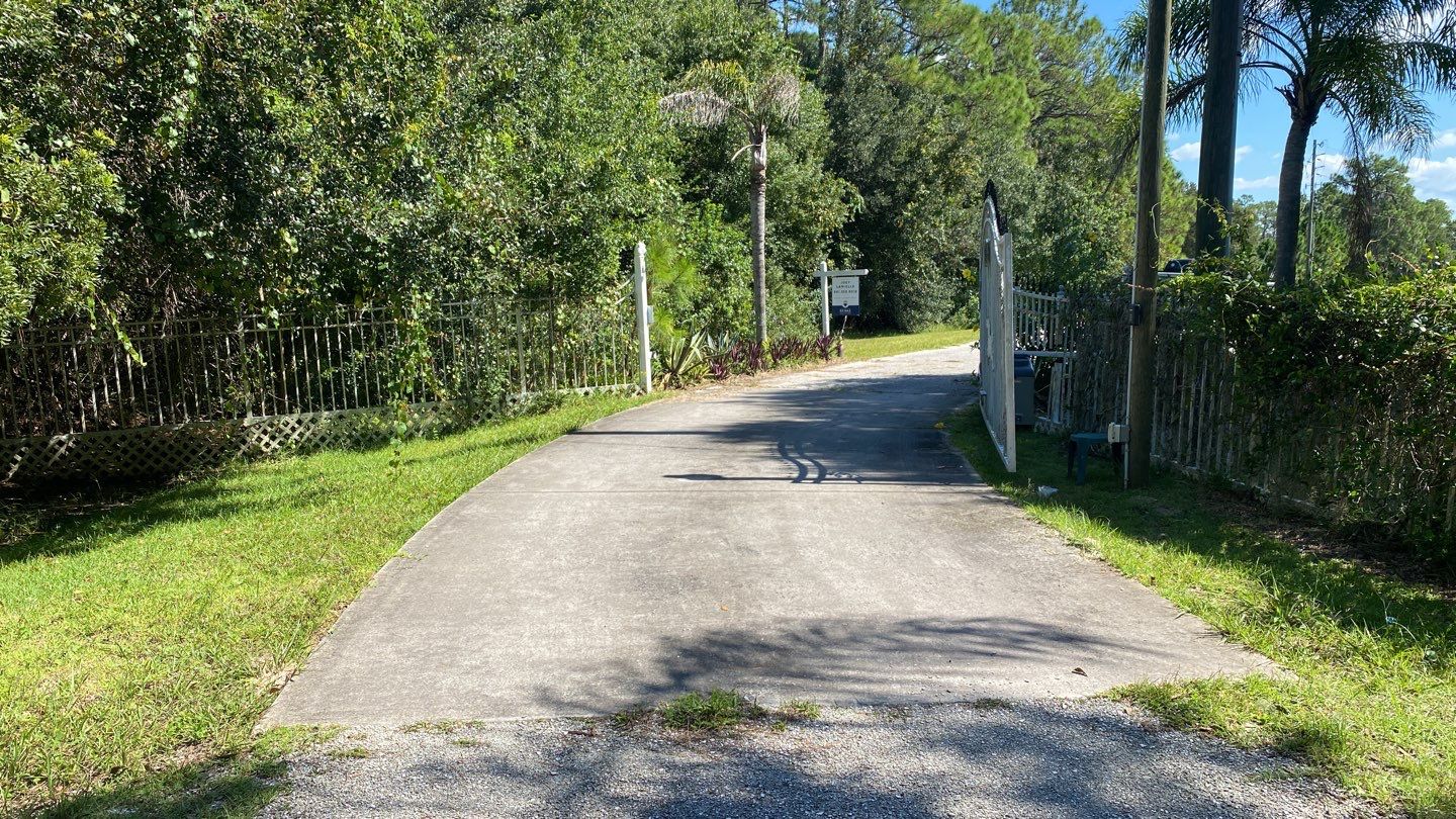 Bradenton, FL Gate Operator Installation & Horizontal Privacy Fence by Asap fence and gates, LLC