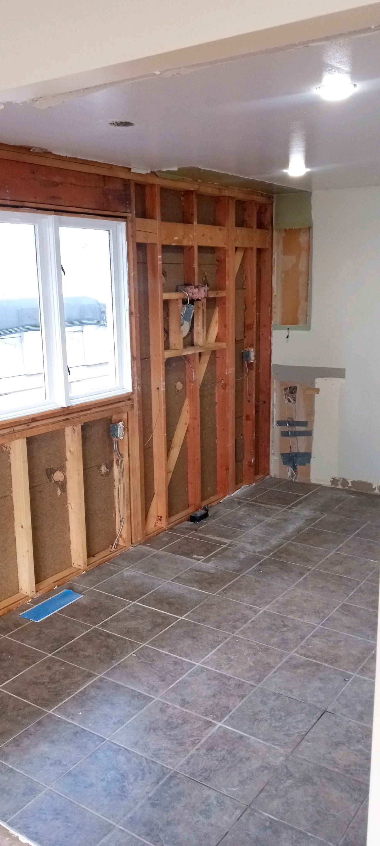Interior Renovations, Kitchen Remodel, and Window Replacement by Ivy Lea Construction