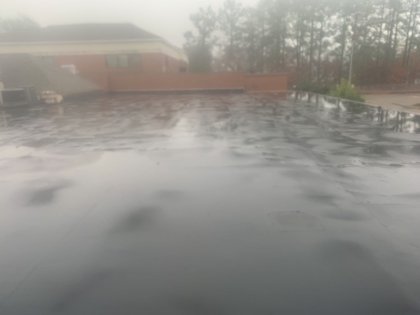 Re Roof (TPO) by American Roofing NC