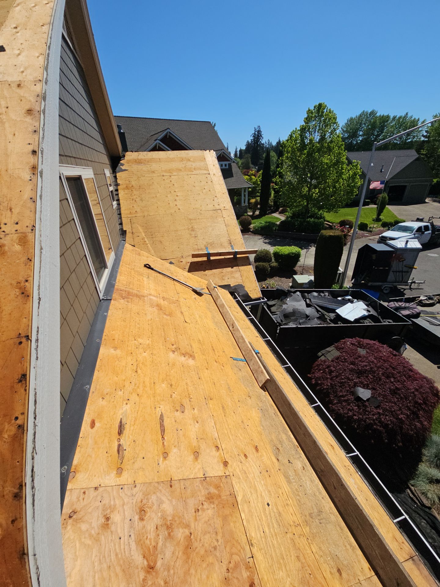 Residential Roofing Installation using Malarkey Vista (Color: Black Oak) by Orezona Building & Roofing Company, Inc.