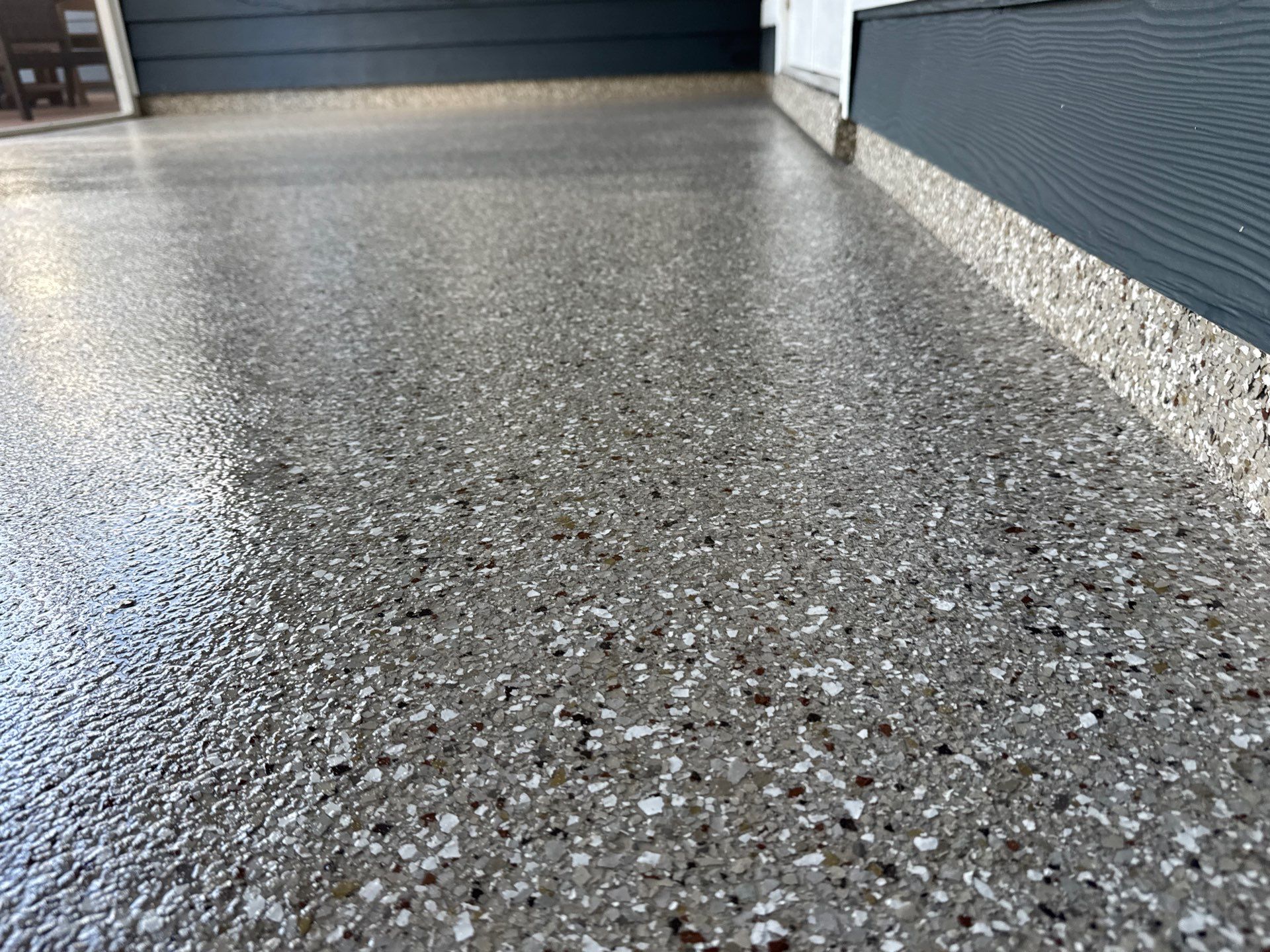 Front and Back Porches in Chiefland, FL in Pebble Beach by Cross Creek Concrete Coatings