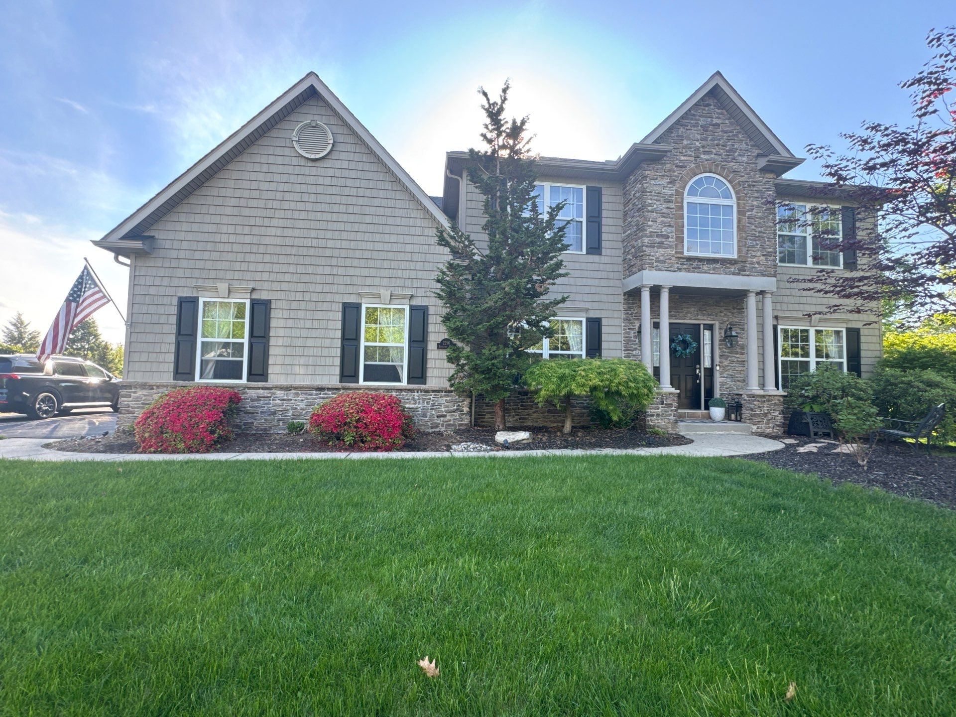 Backyard Retreat: Techo-Bloc Patio + Firepit Lounge by Saylor’s Lawn & Landscape