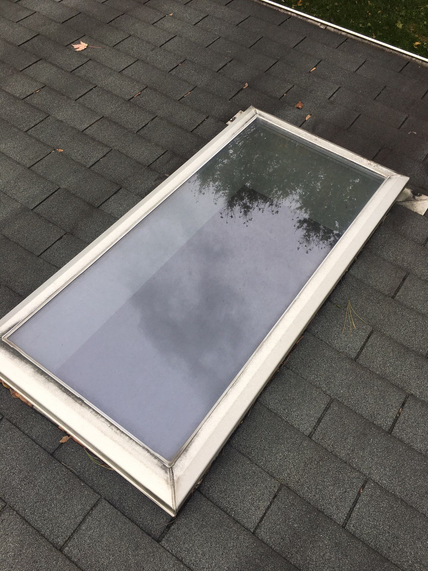 Roof and Skylight Replacement by American Home Contractors