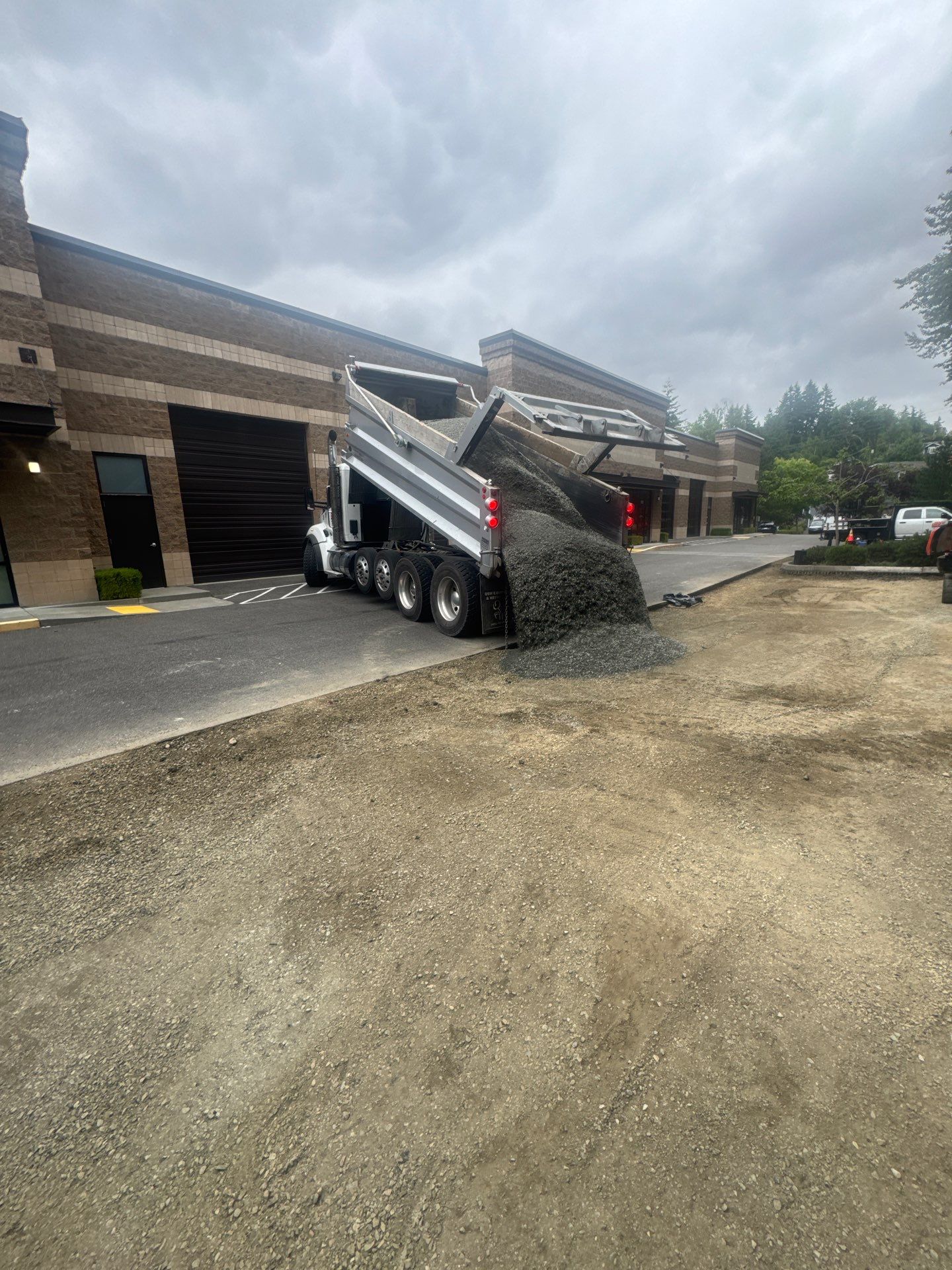 Asphalt Patch Repair & Concrete Curb Renovation | Kirkland  by Jireh Asphalt & Concrete Inc 