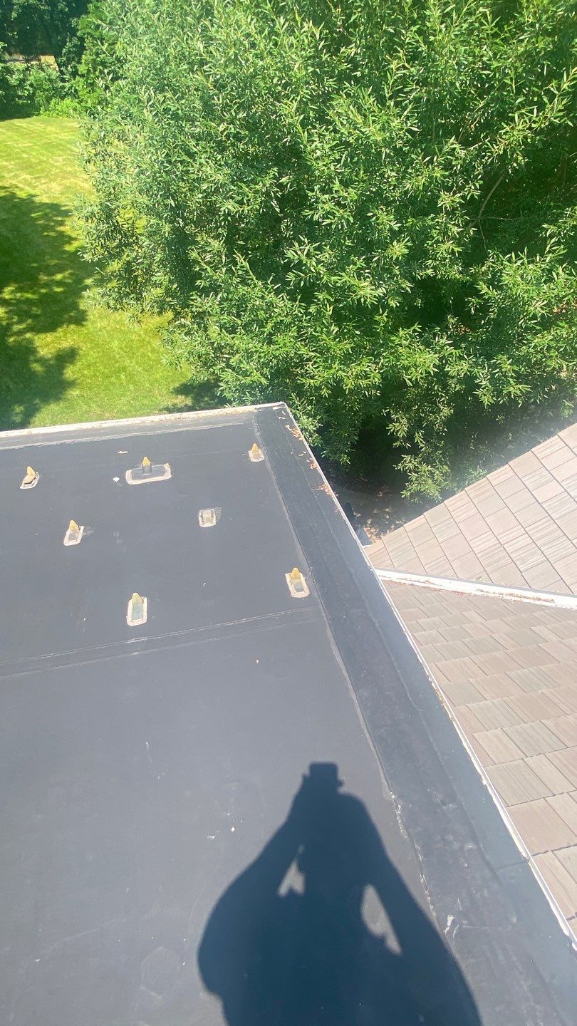 DaVinci Roof Installation with Snow Guards in Oconomowoc Lake by Custom Installations