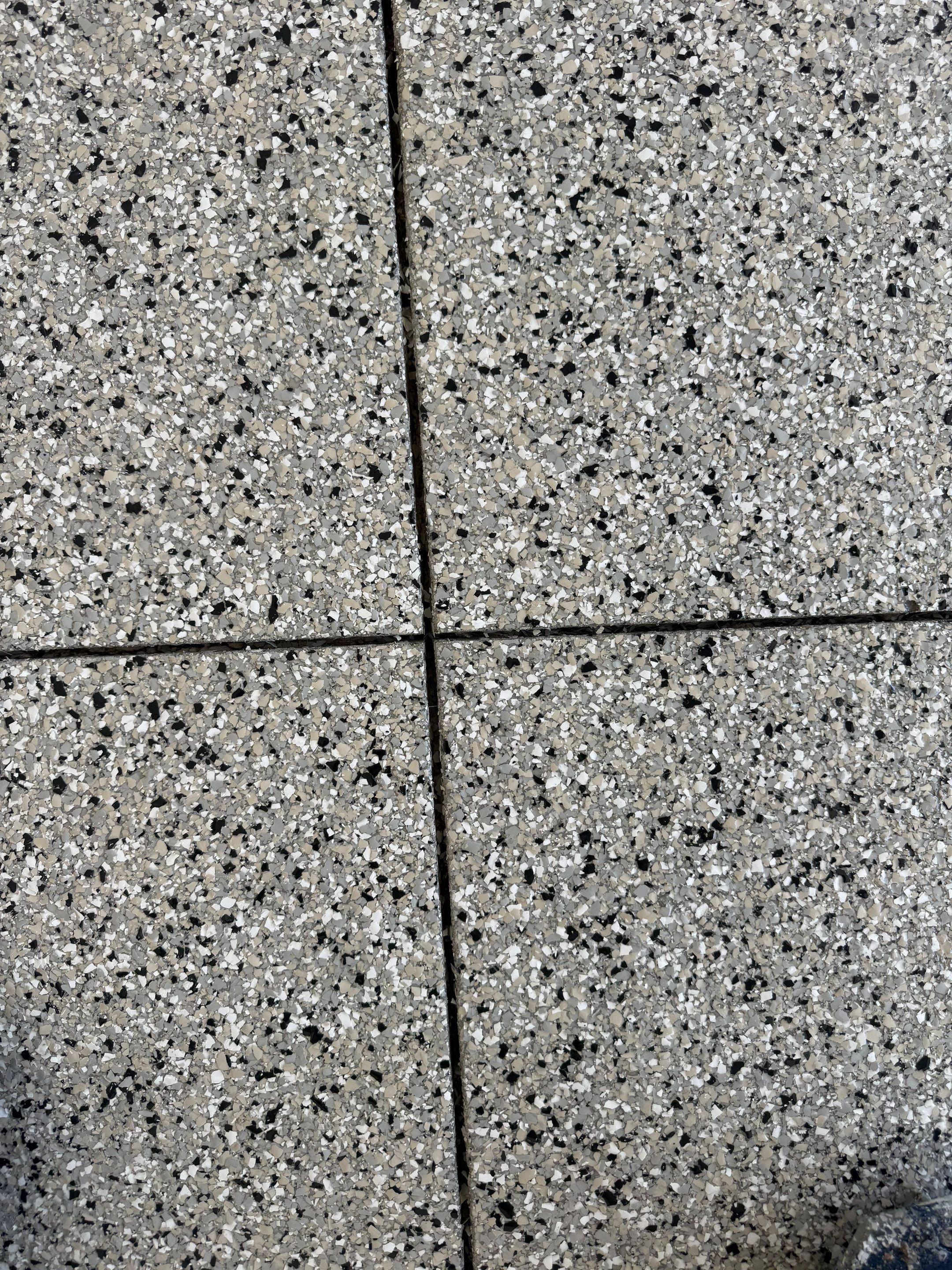 Cabin Fever Garage Floor Coating in Sioux Falls by Select Painting, Coatings & Garage Cabinets