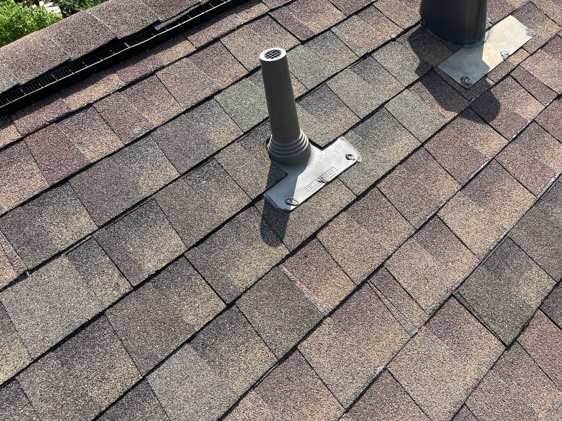 Hail Damage using Owen's Corning Duration (Lifetime) Shingles by Roof Repair Company