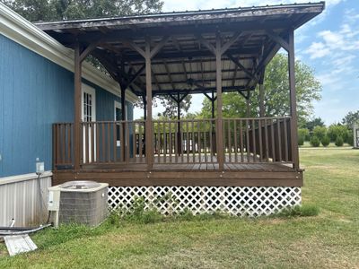 Exterior Painting in Fruitvale, TX | Wood Porch & Home in Deep Navy Blue