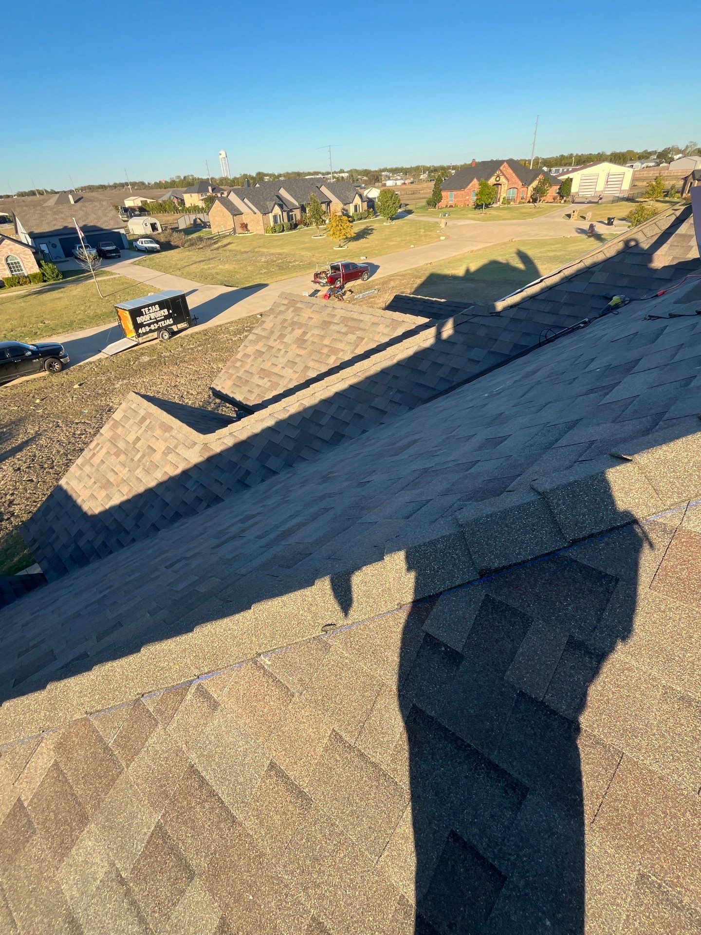 Brick with Malarkey Natural Wood by Tejas Roofworks + Restoration