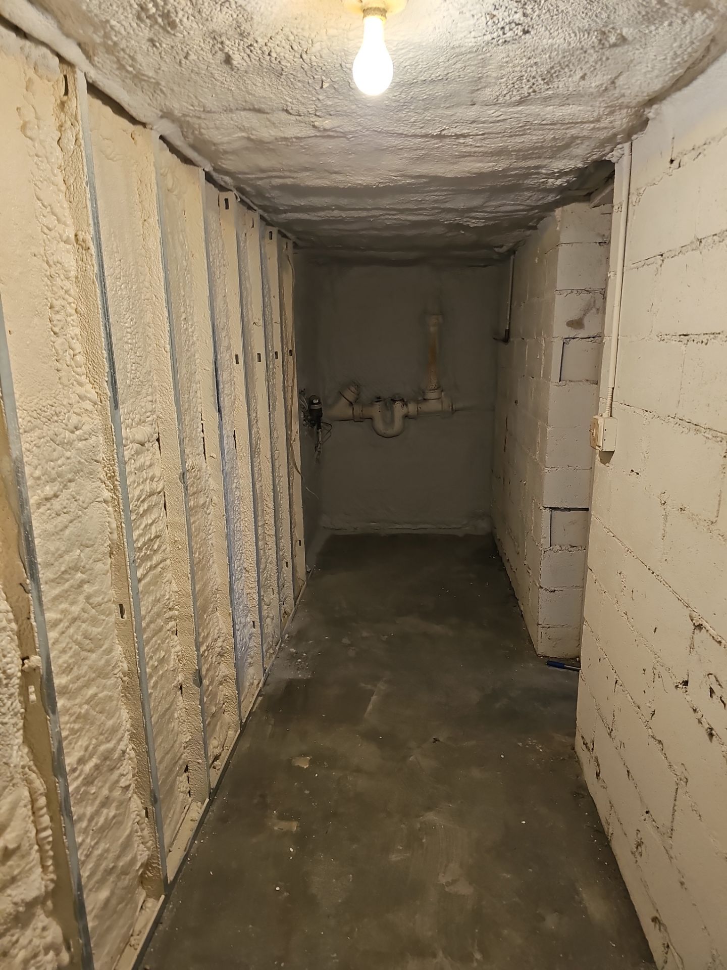 Basement Exterior Walls using Closed Cell Spray Foam by NYS Foam & Energy