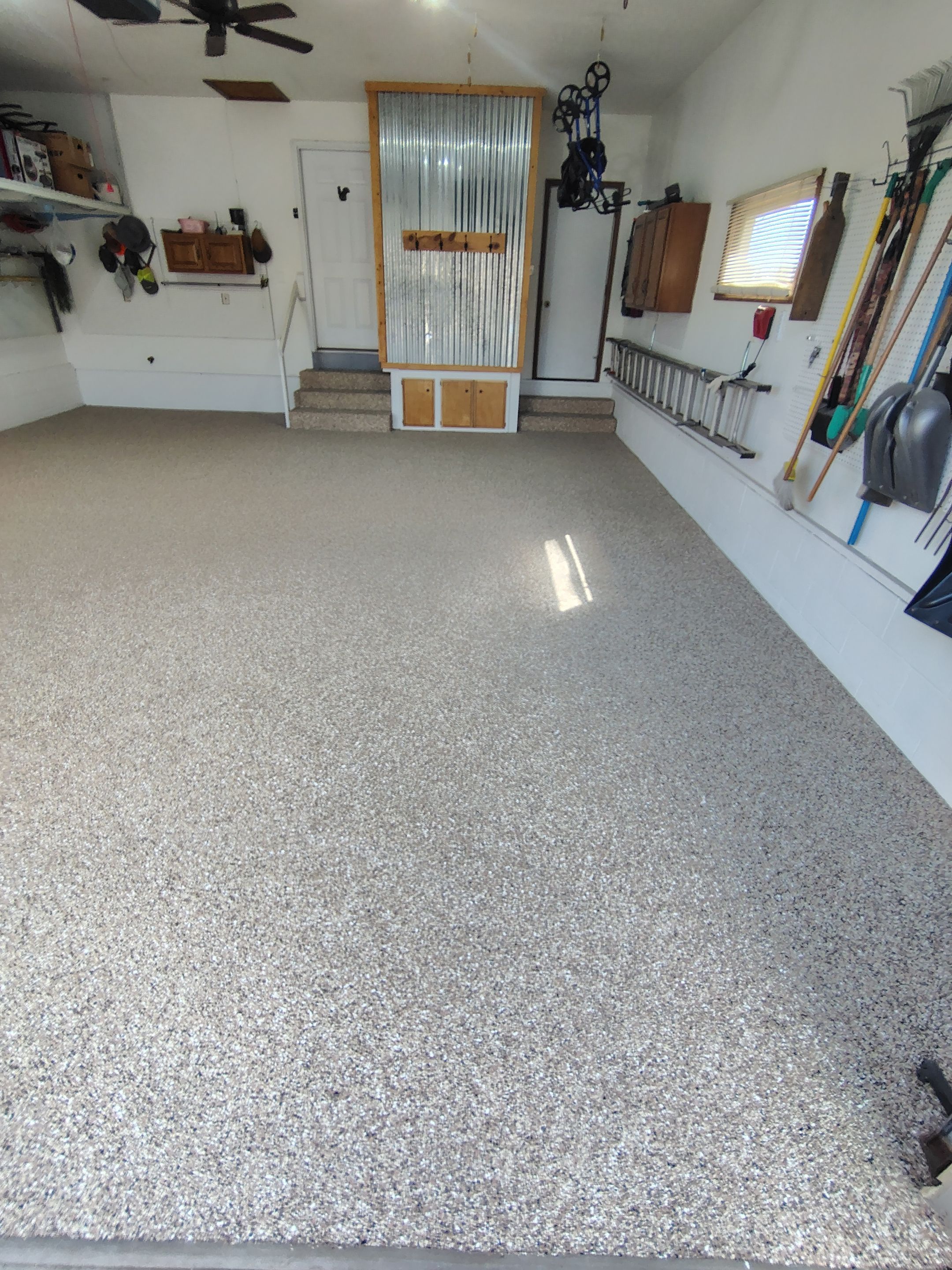 Multi-Colored Flake Epoxy Garage Floor Coating and Crack Repair by Select Painting, Coatings & Garage Cabinets