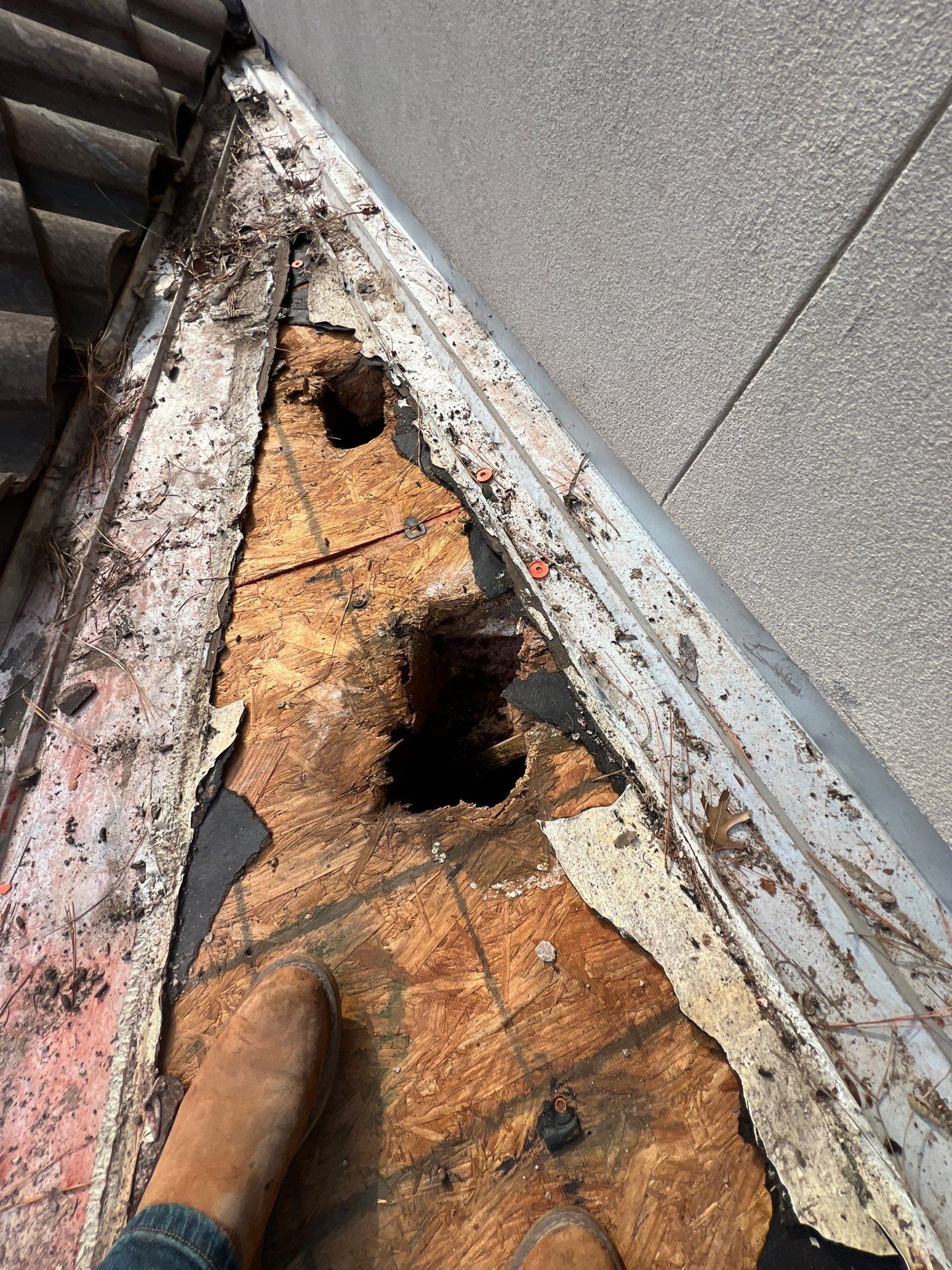 Residential Roofing Repair using tile by Roof Repair Company