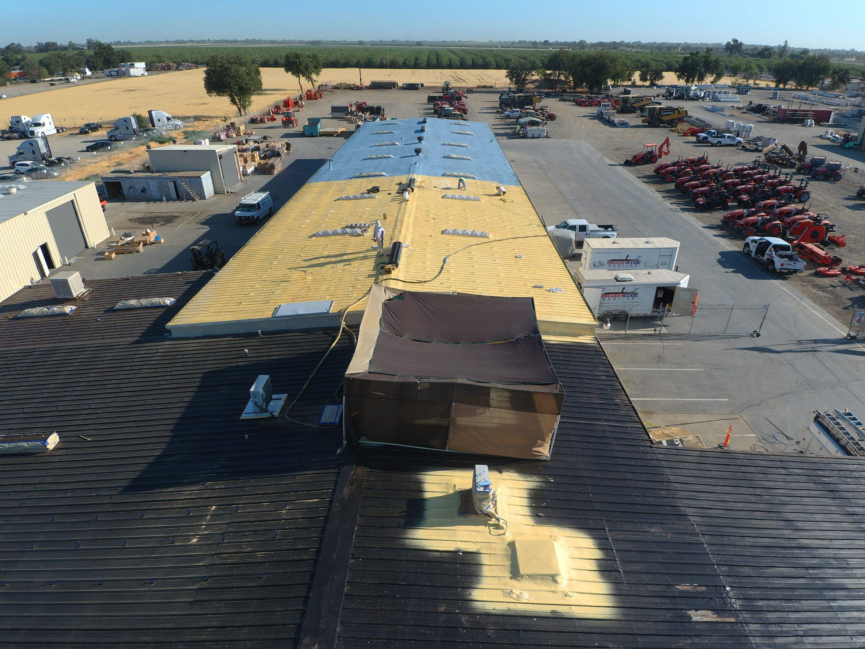 Spray foam and coatings using Conklin Benchmark/PUMA XL coatings and spray foam by Straight Edge Roofing Inc