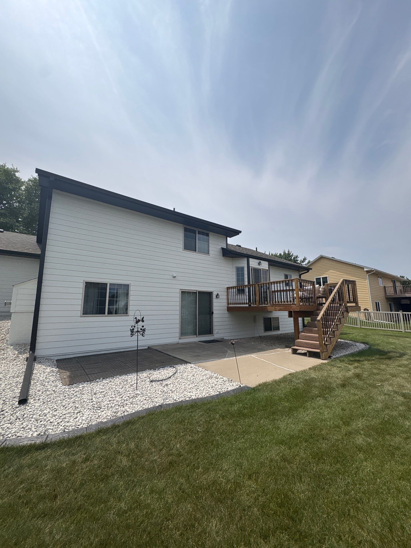 Residential Exterior Painting and Siding Refresh in Sioux Falls by Select Painting, Coatings & Garage Cabinets