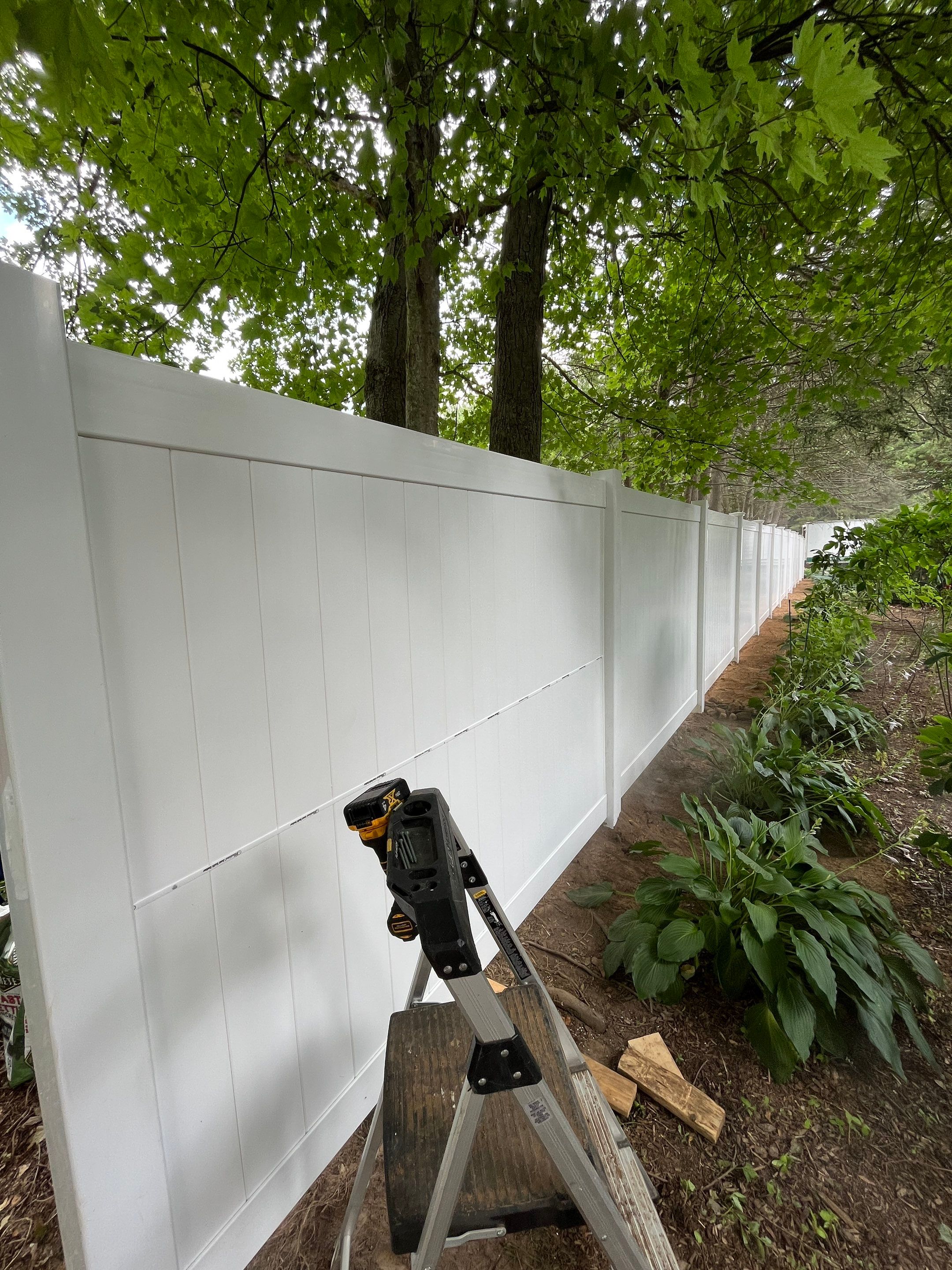 Replacement Vinyl privacy fence in White by DiGiorgi Roofing and Siding Inc