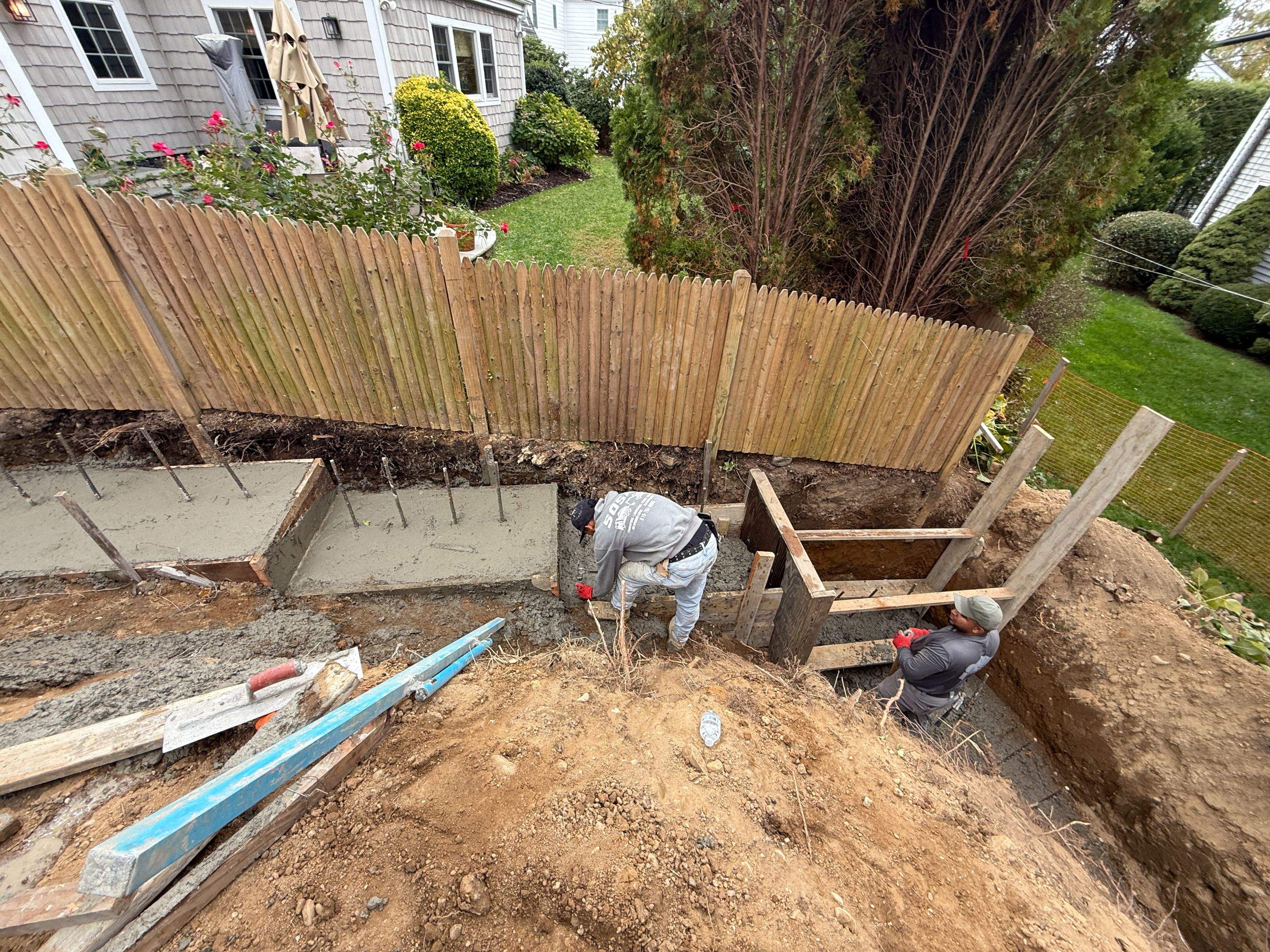 Concrete Retaining Wall Construction in Port Washington by Medina Design & Development Group